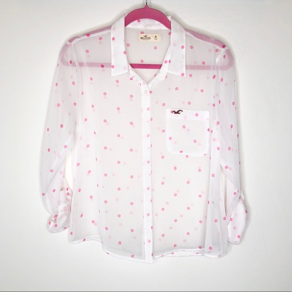 white shirt with pink polka dots
